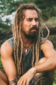 The brightly dyed dreads contrast with the uncolored sides to make the color pop. How To Get And Maintain Perfect Dreadlocks Menshaircuts Com
