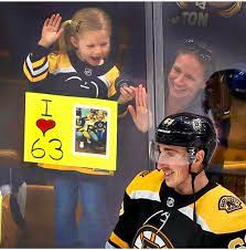 Bradley kevin marchand is an ice hockey player who plays for the canadian hockey team as well as in the national hockey league (nhl) as a left wing for the boston bruins since 2006. Marchand Gave My Daughter A Puck Yesterday During Warmups Which Was Awesome Enough But The Globe Photographer Caught The Moment And Posted It To Instagram Bostonbruins
