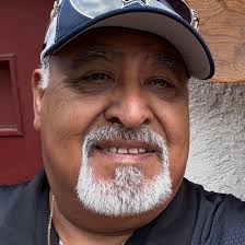 PROBABLY ONLY ONE PERSON I RECOGNIZE IN THIS PICTURE WAYNE SHERMAN THE  THIRD ONE TO THE LEFT I'M NOT SURE IF HE'S ADAM JERNIGAN