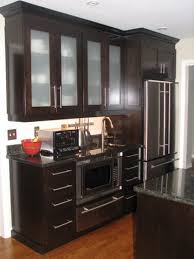Love The Frosted Glass Panels On These Tall Espresso Cabinets Cute Long Handles Too Brown Kitchen Cabinets Kitchen Remodel Kitchen Cupboards Paint