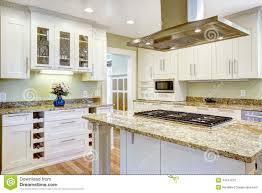 stove, granite top and hood stock