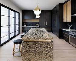 Marble is a natural stone, very popular for kitchen and bathroom countertops as well as for flooring. New Black Marble And Woodstone Finishes In The Kitchen