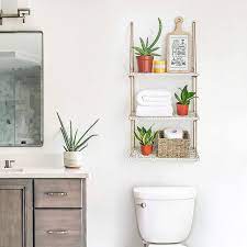 It is compact and secure, and baskets come in all sorts of sizes, shapes, and styles to match your bathroom decor. Smart Over The Toilet Storage Solutions 16 Chic Options