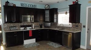 Knowing where to stop the tile horizontally is easy if your kitchen runs in more traditional kitchens, sometimes the tile will run even a little above the bottom of the cabinets, which gives a pleasing overlap that feels more. Backsplash Above Cabinets Novocom Top
