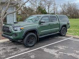 Since modern camper shells are expensive, let's see how to handle a diy project and transform the track's back into a livable and weatherproof place for sleeping or storage. Army Green Thread Let S Keep It Green Tacoma Truck Tacoma World Toyota Trucks
