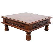 A wonderful teak indian coffee table having carved decoration and iron strap work decoration. Antique Anglo Indian Teak Side Table For Sale At 1stdibs