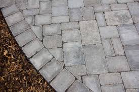 Foto de piscina tradicional, de tamaño medio, rectangular, en patio. Backyard Paver Patios The Landscape Artist Calgary