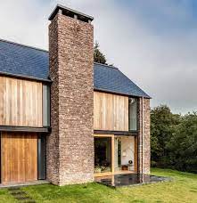 See more ideas about modern outdoor fireplace, outdoor, outdoor living. Today Powerful Chimney Stacks Are Back In Vogue As On This New Hall Bednarczyk Architects Barn Style Home Chimney Design Chimney Exterior Modern Chimney