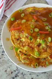 Egg foo young is a fluffy chinese egg omelette filled with vegetables and pork or shrimp, smothered in a tasty chinese sauce. Egg Foo Young Egg Foo Yung Small Town Woman