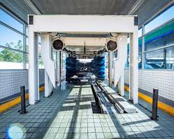 This is small (2 bay) touchless carwash tucked away across the street from the bowling alley. Car Wash