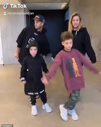 Jules and Guy Sebastian perform a TikTok dance with sons Hudson and Archer 