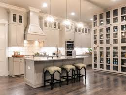 Cabinets provide a functional and fashionable way to store food, dinnerware, equipment, and other cooking necessities. Wall Length Kitchen Cabinets Create Ample Storage And Display Space Jared Plan Open Floor Concept Home Kitchens Kitchen Remodel