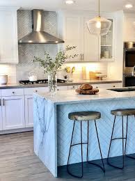 Maybe you would like to learn more about one of these? White Herringbone Tiles On Center Island Transitional Kitchen