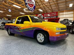 Image result for Bright Yellow 1990 Truck
