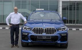 The x6 was marketed as a sports activity coupé (sac) by bmw, referencing its sloping rear roof design. 2020 Bmw X6 Launched Priced At Inr 95 Lakh Iab Report