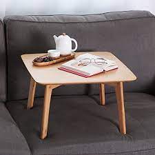 Storage coffee tables are a great way to organize and declutter your living room space. Zen S Bamboo Small Coffee Table Square Tatami Table Storage Basket 2 Sponge Cushions Living Room Furniture Buy Online At Best Price In Uae Amazon Ae