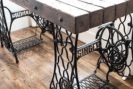 Computer desks, work tables and more. Industrial Desk Made From Antique Singer Sewing Machine Treadle Bases