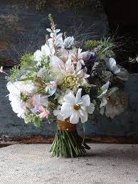 Find the right flowers for your spring wedding in this gorgeous collection of bridal bouquets and floral centerpieces. Beautiful Summer Flowers In This Hand Tie Bouquet Would Compliment Any Spring Or Summer Garden Styled Wedding Flowers Bouquet Flowers Uk Wedding Bouquets