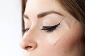 Dab small dots of a light foundation across your face with your finger and use a brush to blend the foundation evenly across your skin. Once And For All Here S How To Do The Winged Eyeliner Tape Trick Youcandoit Shefinds