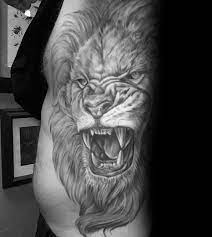 Top 51 Realistic Lion Tattoo Ideas 2021 Inspiration Guide Realistic Lion Tattoo Lion Tattoo Tattoo Designs Men