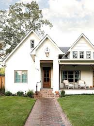 Black And White Painted Brick House White Painted Brick House White Brick Wood Front Door Porch Cool Numbers And Lantern Fancy Walkway A Wh Modern Farmhouse Exterior House Exterior Exterior Brick