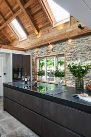 keukenfronten in donker staal imitatie een prachtige combinatie met het hout keukens house droomhuizen