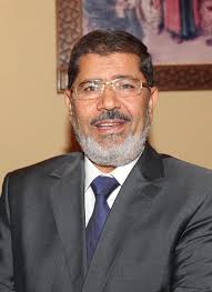 KUNA : Morsi considers army moves "military coup"