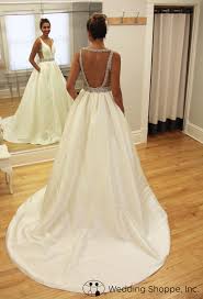 Draped In Silky Shantung This Dreamy Ball Gown Wedding Dress Features A Fitted Sleeveless Bodi Backless Bridal Gowns Affordable Bridal Dresses Wedding Dresses