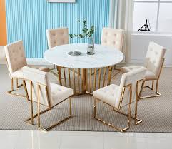 Dining room sets by ashley furniture homestore from the latest styles of bar furniture to dining room sets, ashley homestore combines the latest trends with technology to give you the very best for your home. Doha Dining Set Ivory And Gold Chairs With Round Marble Table Briq