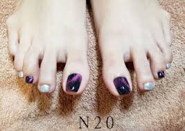 Pink manicure and pedicure with a orchid flower isolated. 3d Nail Art Design White Bejewelled Almond Nails N20 Nail Spa