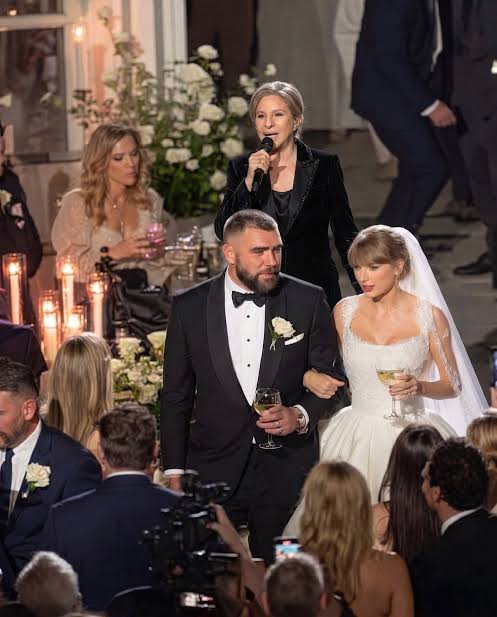 The Taylor Swift and Travis Kelce wedding hype isn't your standard  celebrity gossip. It's the upshot of Swift's journey as a songwriter,  Business Insider's Callie Ahlgrim writes. (Credit: Getty Image