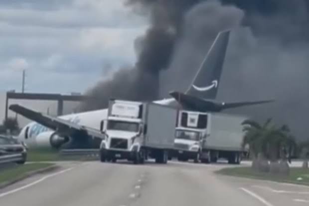 US plane crash: Amazon cargo jet overshoots airport in Miami | Nine.com.au