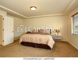 It is minimalistic, yet trendy. Nice Master Bedroom With Simple Decor Simple Master Bedroom With Tv And Tan Bedding Canstock