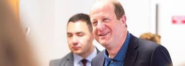 Small businesses get spotlight in Polis tour of Incubator