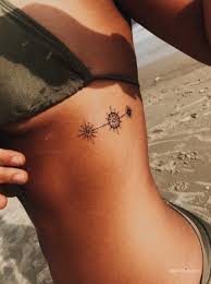 Flowers in general are a pretty choice whether you opt to get it inked on your rib or not. 23 Cute Small Tattoos For Women With Meaning Inspired Beauty Rib Tattoos For Women Hip Tattoos Women Small Girl Tattoos