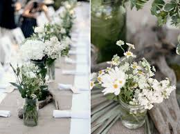All White Wild Flowers In Mason Jars Wedding Wedding Flowers Seaside Wedding