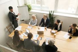 Download African American Ceo Giving Presentation At Corporate Team Meeting Concept For Free Corporate Training Skills Development Employee Training
