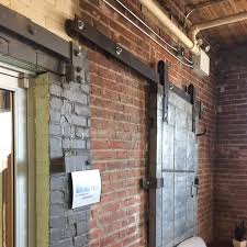 Exposed Brick Is A Popular Interior Design Feature Commonly Found In Older Buildings This Brick Is Often Dirt How To Clean Brick Brick Popular Interior Design