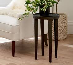 This small element of bedroom furniture provides storage space in its two drawers. Jamie 12 Round Metal Accent Table Pottery Barn