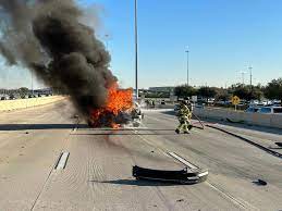 One person hurt in fiery car accident on Highway 290