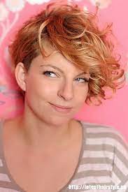 The side part and asymmetrical nature of this cut create a flattering shape that's. Daring Curly Asymmetrical Short Haircut Haircuts For Curly Hair Short Curly Haircuts Wavy Haircuts