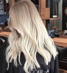 This natural looking shade is a mixture of warm honey image: Dreamy Blonde Balayage Light Blonde Hair Long Hair Styles Hair Styles