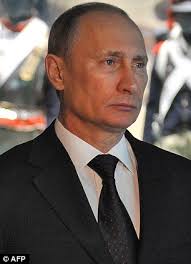 Russian President Vladimir Putin has family living on the Costa del Sol and has recently made two trips to the area - article-0-14BBD7C4000005DC-49_306x423