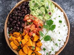 Sweet potato waffles with cranberry maple syrup Sweet Potato And Black Bean Burrito Bowl Vegan One Green Planet
