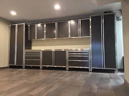 Organise your garage or workshop with our wide range of modular garage cabinets. Matching Garage Cabinets To Custom Garage Flooring Vault Custom Garages