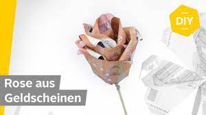 Zum basteln dieser geldgeschenk idee benötigst du einen euro geldschein und. Geldscheine Falten Rose Fur Kreative Geldgeschenke Roombeez Powered By Otto Youtube