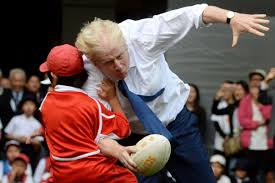 But, strolling in the same park mr hancock was pictured in, boris johnson 's father insisted he was right to defy the prime minister's pleas. Boris Johnson Rugby Tackle Takes Out Schoolboy 10 In Japan London Evening Standard Evening Standard