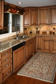 This countertop color is a subtle contrast to the golden wood hue of maple cabinets. Kitchen Backsplashes With Maple Cabinets Maple Kitchen Cabinets With Home Decor At Repinned Net
