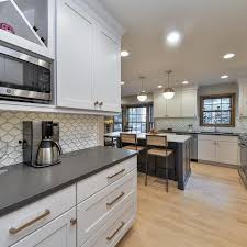 Light gray kitchen with dark grey island transitional. Photos Hgtv