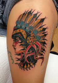 This colorful neck piece has the face of a tribal woman with long feathers and a braided tail. Wolf Mandala Tattoo Design Novocom Top